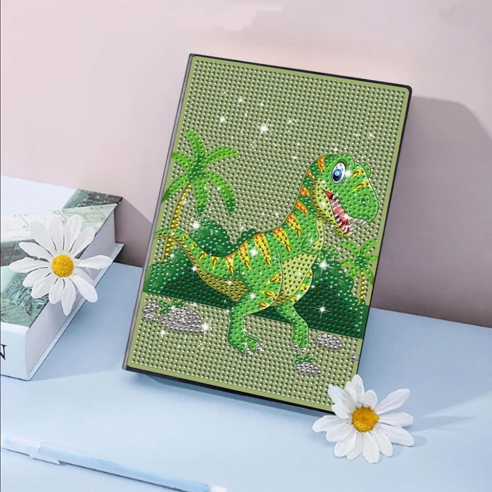 Notesbog med en sej grøn dinosaur